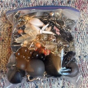 Ziplock bag filled with chunky (mostly) vintage necklaces